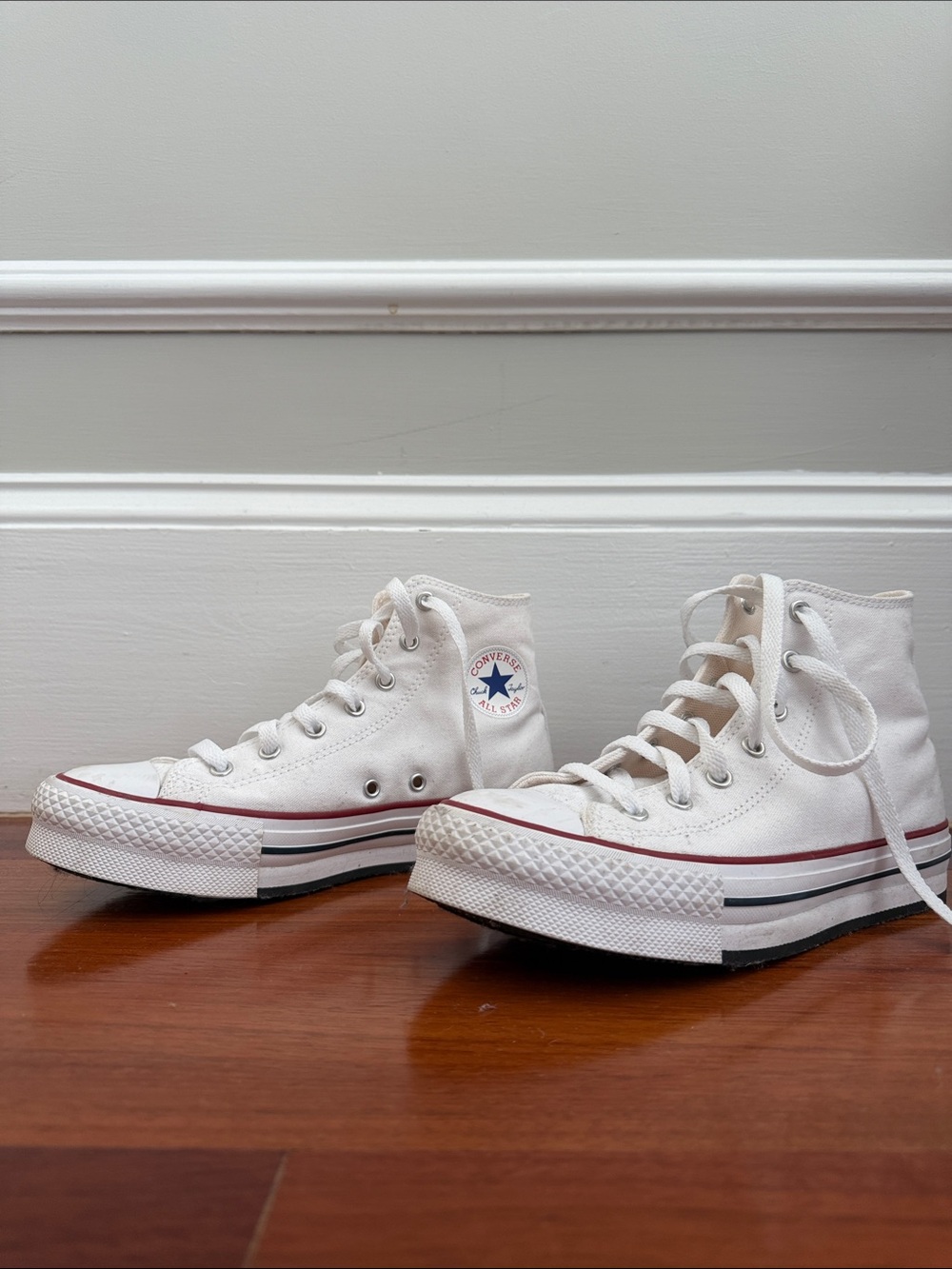 Converse High Top Sneakers in White with Red & Black Stripe